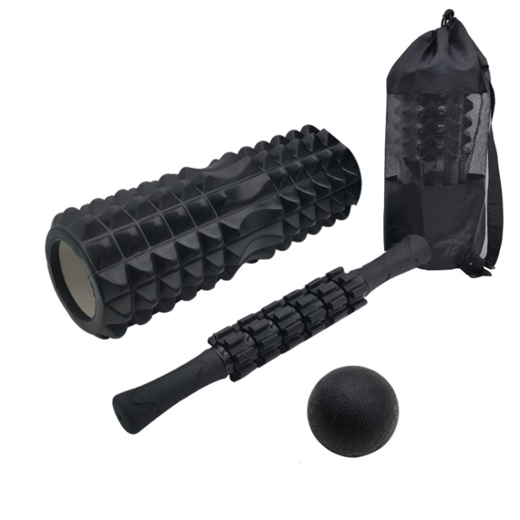 Black foam roller and massage bar set with ball, in carrying bag
