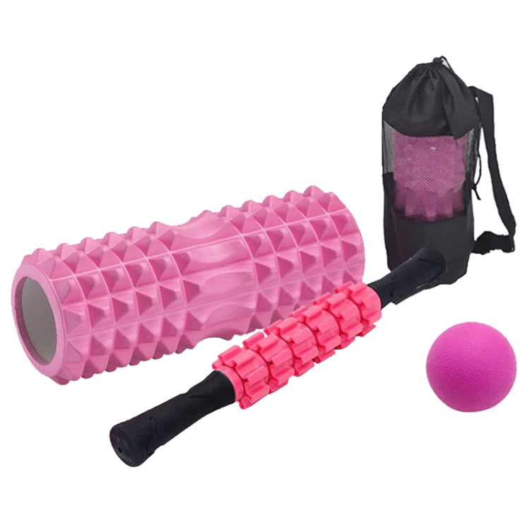 Pink foam roller and massage bar set with pink ball, in carrying bag