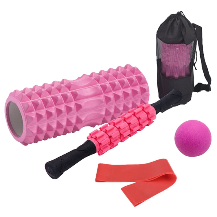 Pink foam roller set with black massage stick, purple ball, red resistance bands, bag