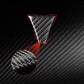 Black carbon-fiber triangular grille sticker with red outline highlight
