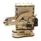 Wooden robot coin-eating toy with side arm, gray motor parts, and orange accents