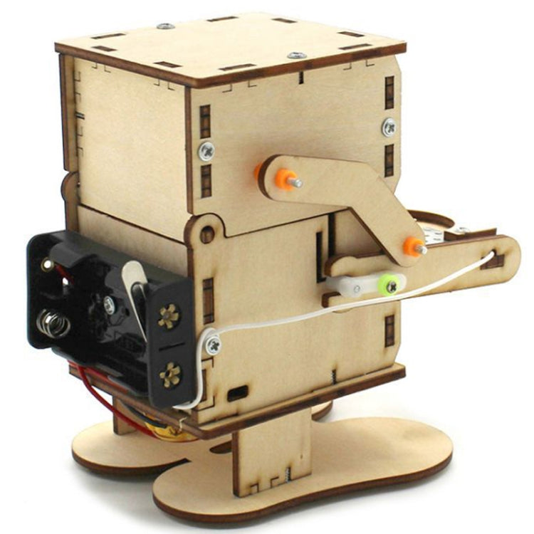 Wooden robot coin-eating toy, close side view with orange knob and wire connections