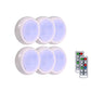 Set of six circular white night lights with soft blue glow and included remote