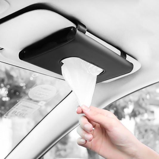 Black leather car tissue holder with flap opening and tissue pulled through