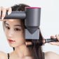 Dyson hair dryer with gray anti-flying nozzle attachment styling hair