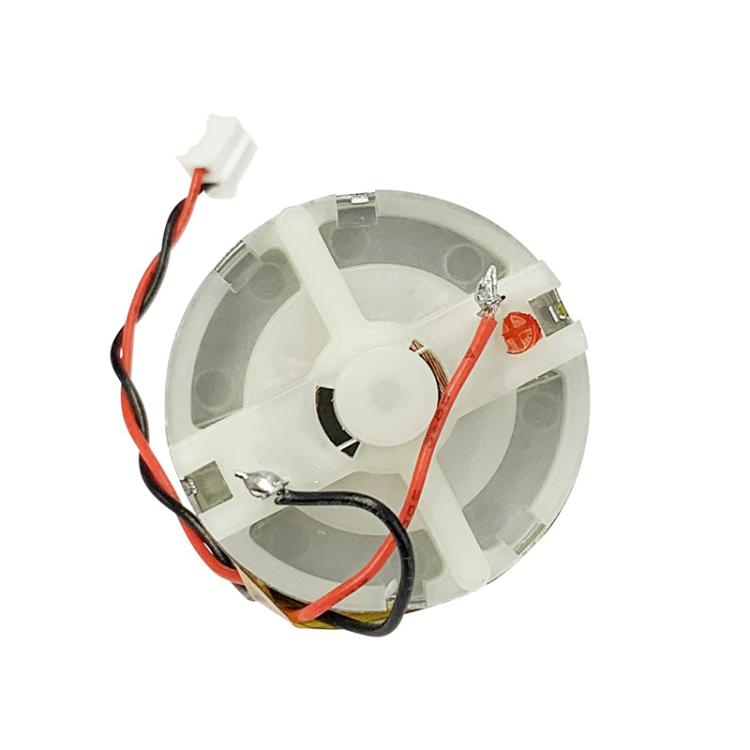 Laser distance sensor motor underside with metal plate, red/black wires, and connectors
