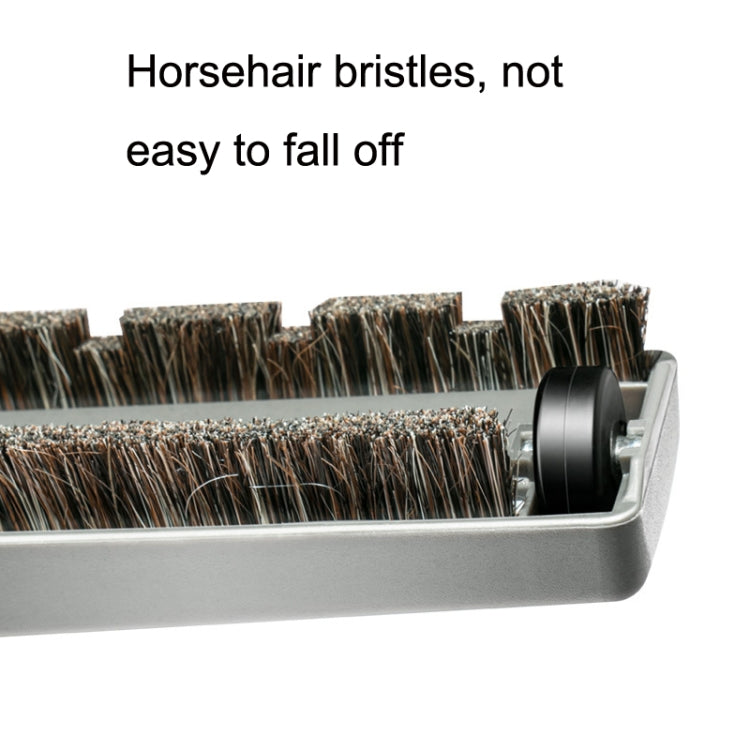 Brush bar with dense bristle rows inside a gray housing