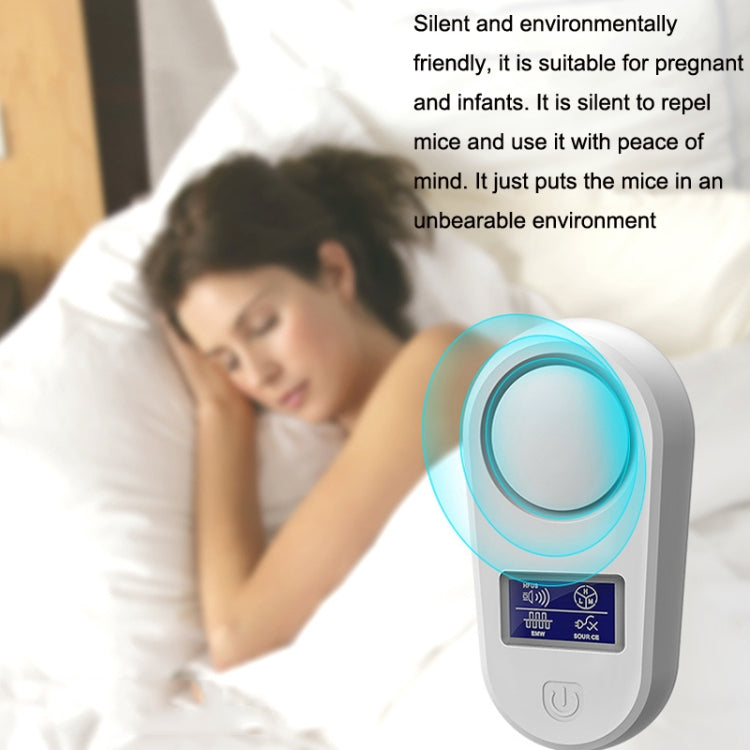 Grey ultrasonic pest repellent with glowing ring light and front control buttons
