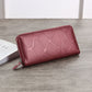 Burgundy zip-around long wallet with embossed stone-style pattern