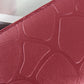 Burgundy embossed stone-style wallet panel with zipper edge