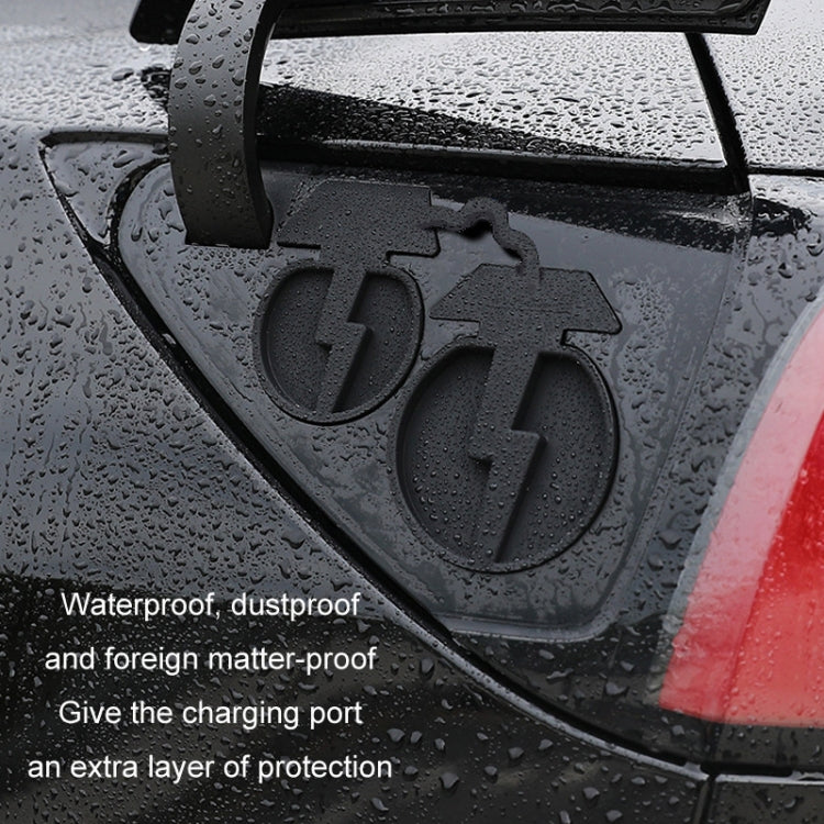 Black silicone charging port dustproof cover installed on car, water-bead surface