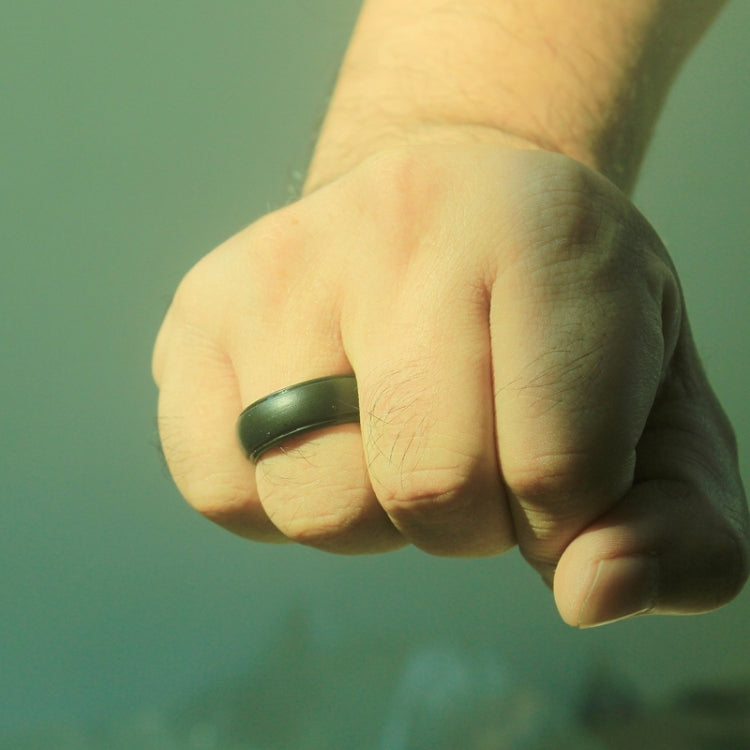 Green silicone curved step ring, 8mm wide, on hand