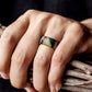 Camo green wide silicone step ring on hand, curved band