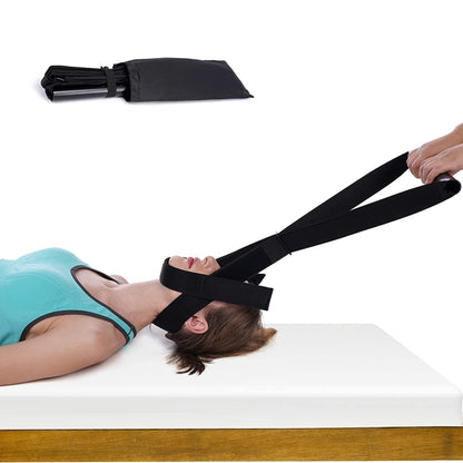 Black Y-strap spine traction device with chin strap, shown positioned on a user