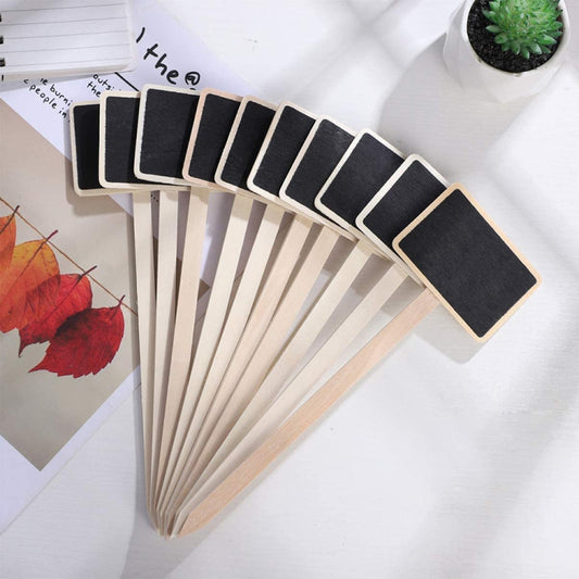 Wooden blackboard plant name tags on stakes, displayed in a fan arrangement
