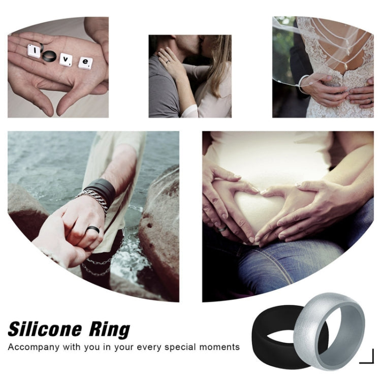 Pair of curved silicone rings, black and light gray, shown together