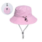 Pink waterproof fisherman hat with drawstring chin strap and packable fold design