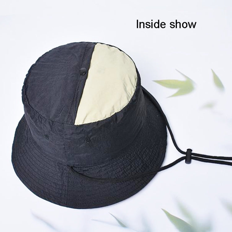 Navy foldable bucket sun hat showing interior lining and chin cord