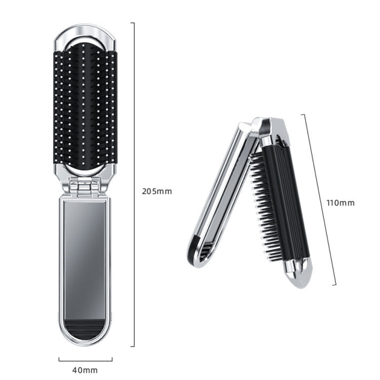 Folded hair comb with mirror compartment; black bristle section, silver chrome finish