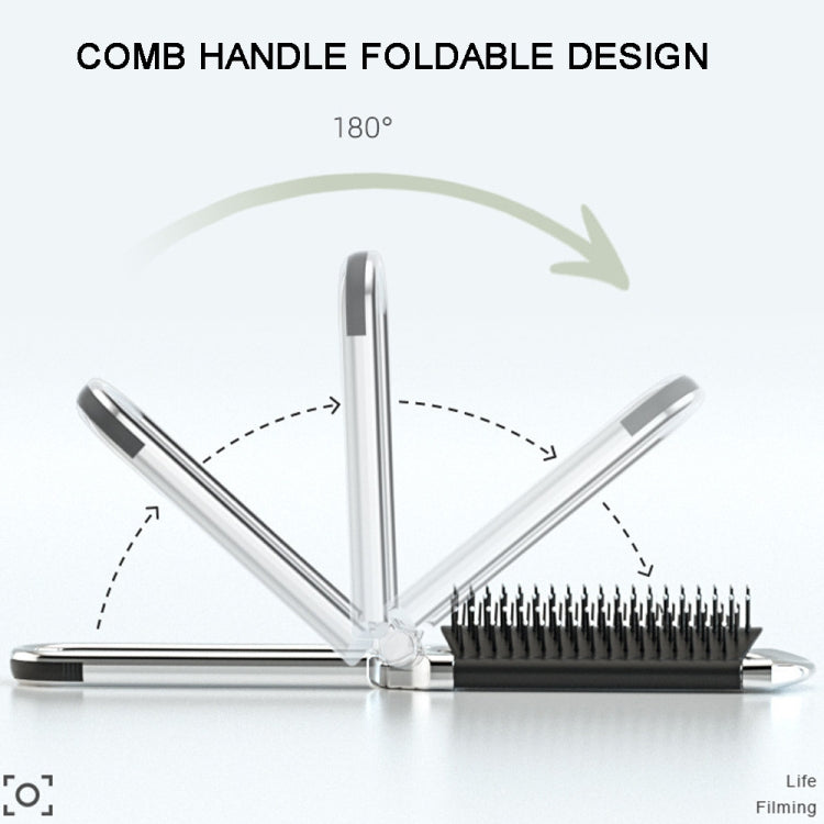 Folding comb handle with 180° pivot and black bristle head, silver frame