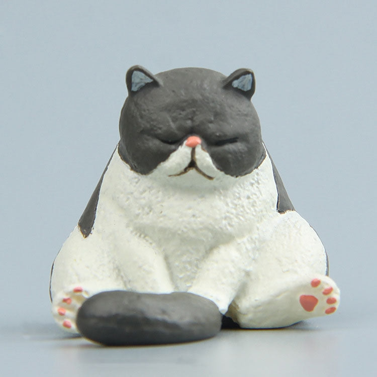 Sitting gray cat fridge magnet figure with white belly and pink nose