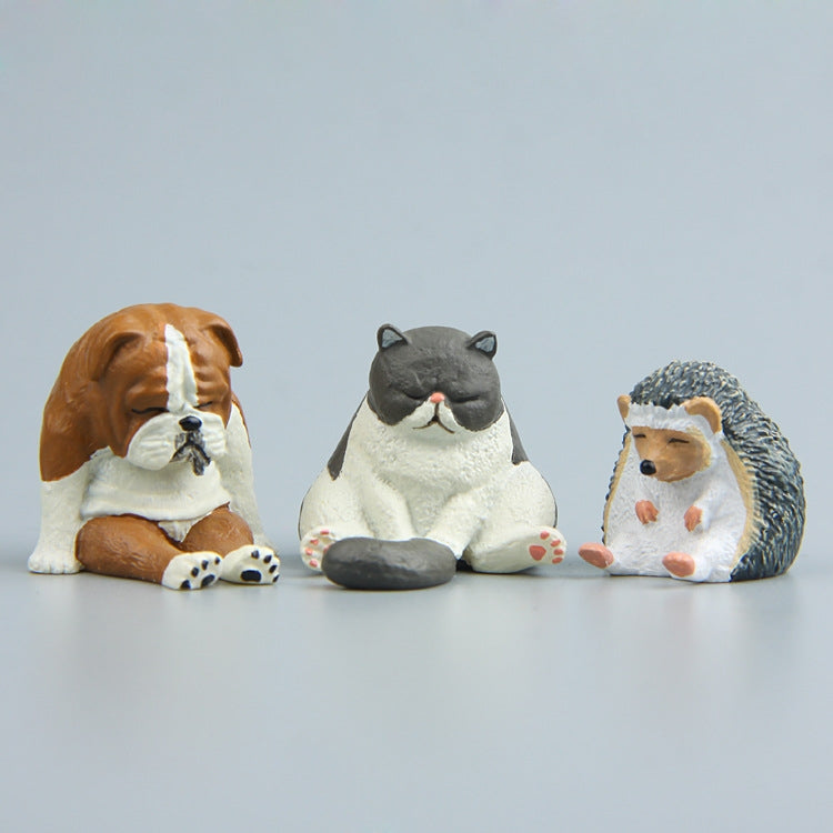 Warm zoo fridge magnet figures: pug dog, gray cat, and hedgehog