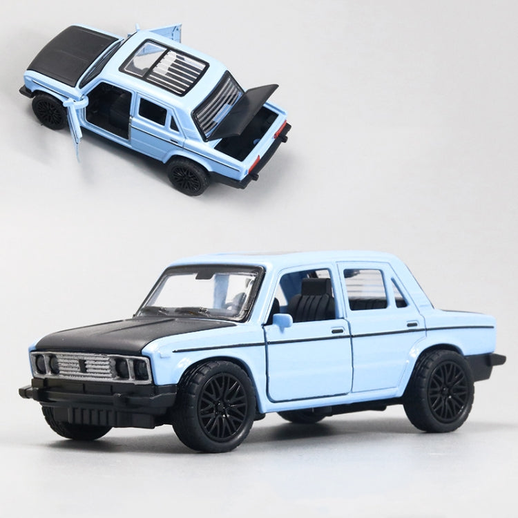 Light blue die-cast alloy car model toy with open door and black wheels