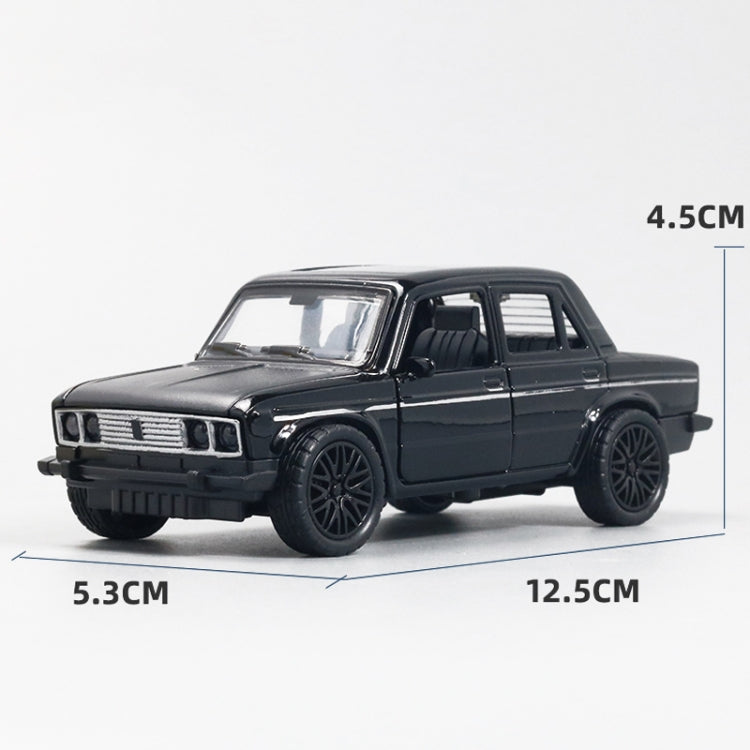 Small black die-cast alloy car model toy with open door detail