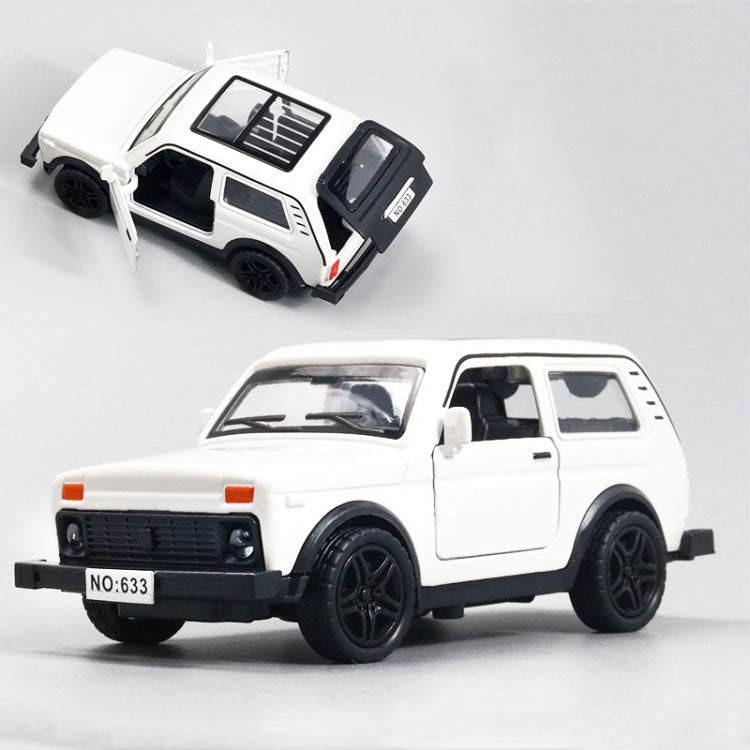 White die-cast alloy car model toy with open door and black wheels