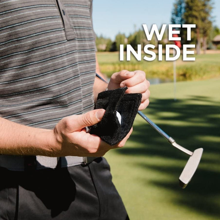 Black microfiber fleece golf ball cleaning towel held for drying during use