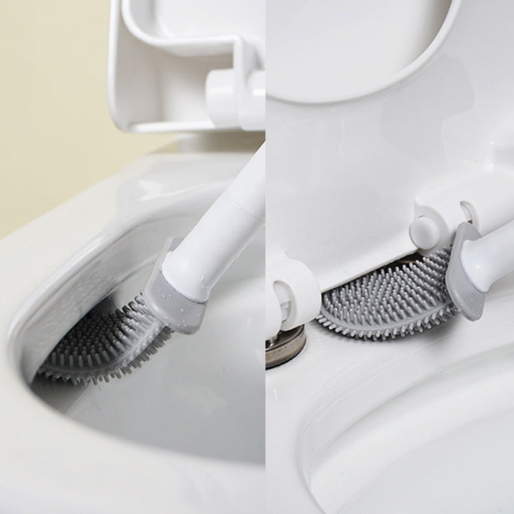Soft rubber toilet brush with curved head and clip mount for toilet rim