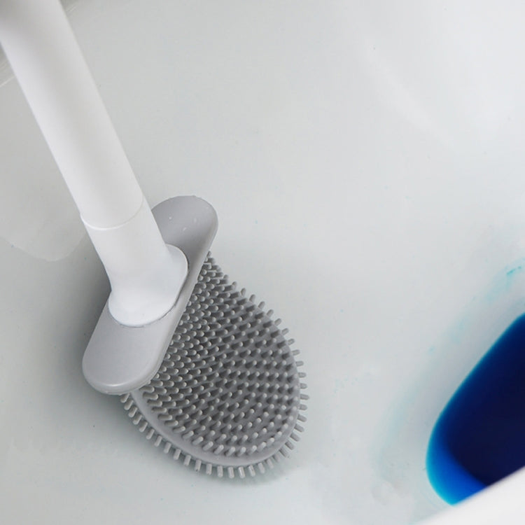 Soft rubber toilet brush head with rounded gray bristle pad for bowl cleaning
