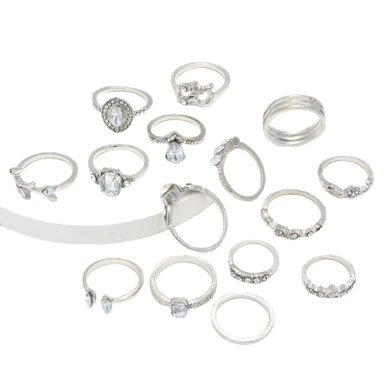Set of silver-tone rhinestone rings with heart and water-drop designs, 15 pieces