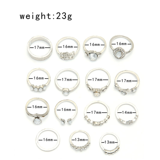 15-piece set of silver-tone rhinestone rings with size markings and gem settings