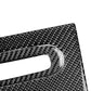 Black carbon fiber glove box sticker detail with oval cutout and inner frame