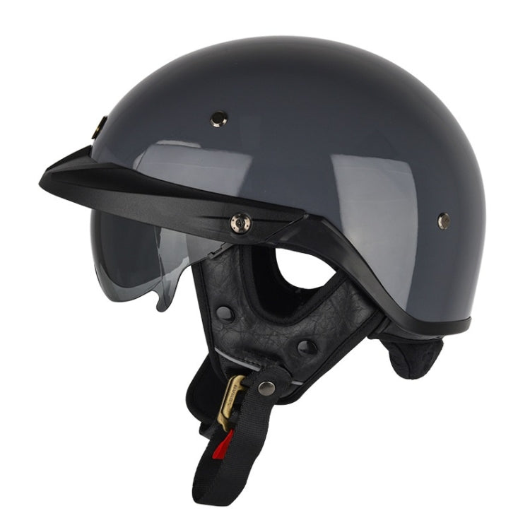 Black half-face motorcycle helmet with clear visor and chin strap