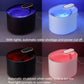 Automatic pet water fountains in black, white, and pink with glowing light tops