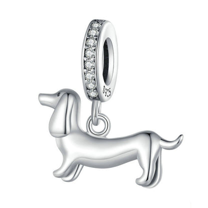 Sterling silver dachshund charm pendant with sparkling ring bail, side view