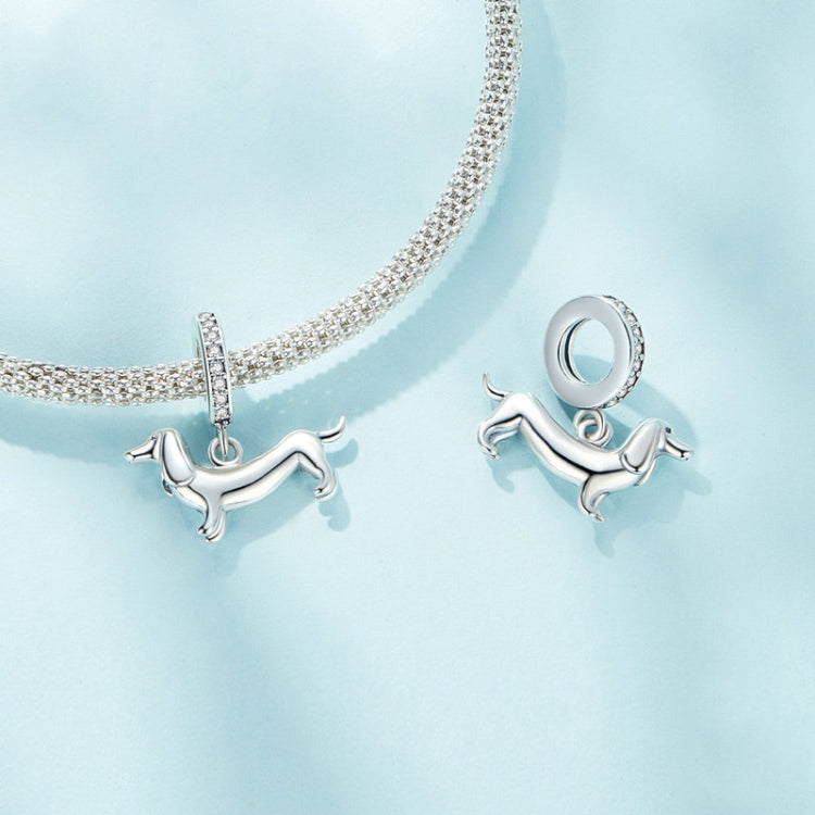 Sterling silver dachshund charm and round ring bail on mesh chain bracelet