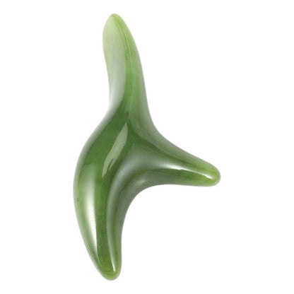 Green glossy sparrow-shaped massage point tool with three curved prongs.