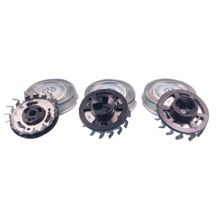 Triple shaver blade foil heads showing circular foils and central blade hubs