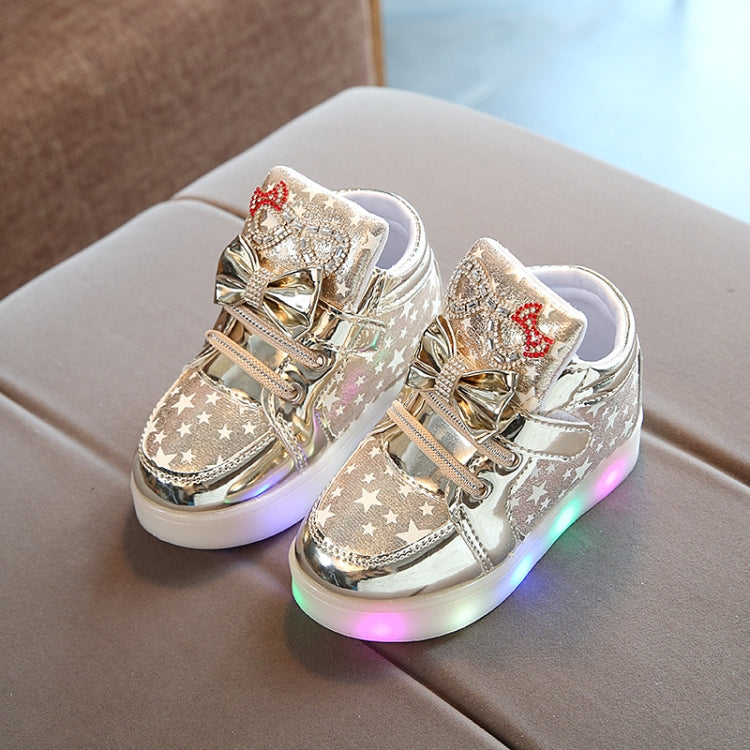 Kids flashing sneakers, metallic silver star pattern with red bow, multicolor LED around sole
