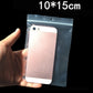 Transparent perforated ziplock bag size 10x15cm with double hanging holes, held up
