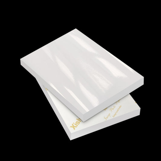 White waterproof inkjet photo paper stack with two sheets, glossy surface