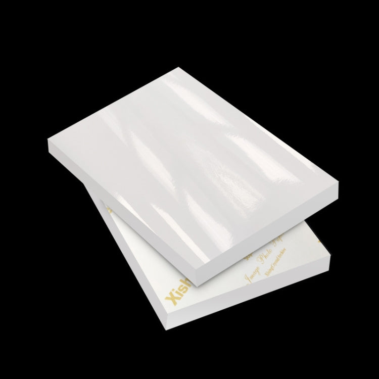 Stack of white waterproof RC photo paper sheets with glossy finish, 260g.