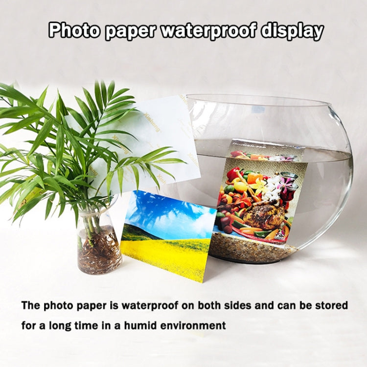 Waterproof photo paper sheets with colorful prints on both sides