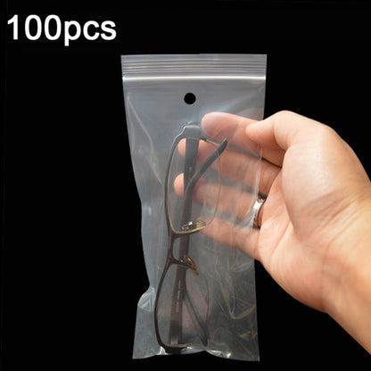 Clear plastic zip-lock packaging bag with small hanging hole at top, perforated header seal