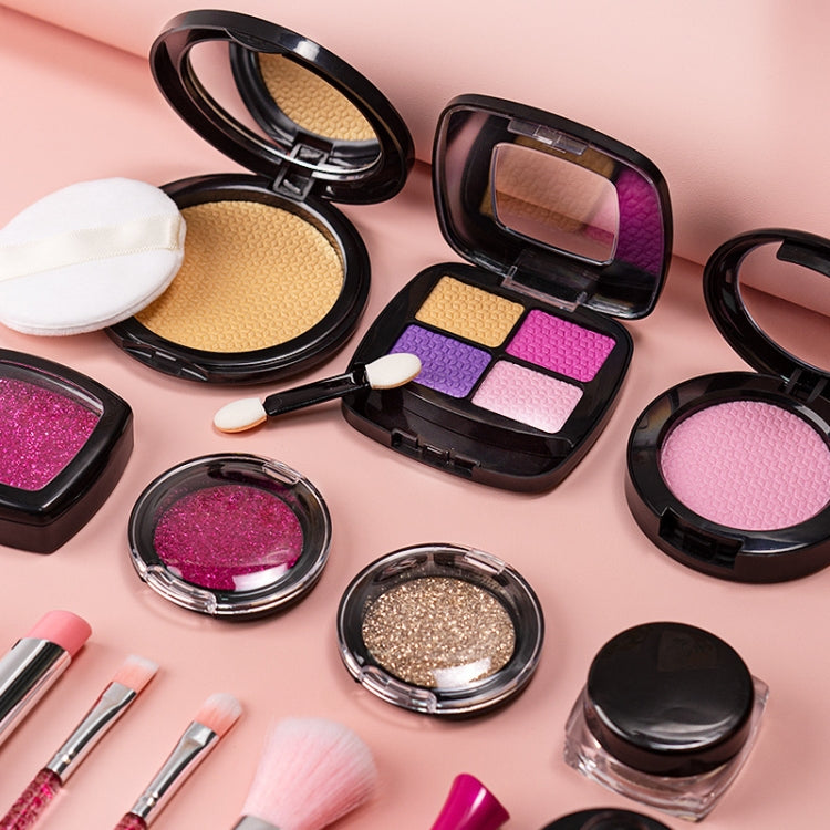 Kids makeup compact set with pink and purple eyeshadow pans, shimmer shades, and puff