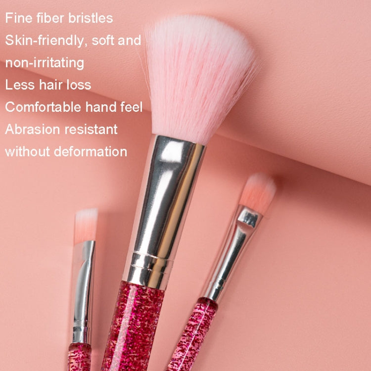 Makeup brush set with soft bristles and pink glitter handles