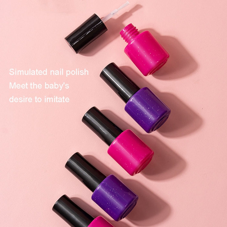Assorted toy nail polish bottles with black caps in pink and purple